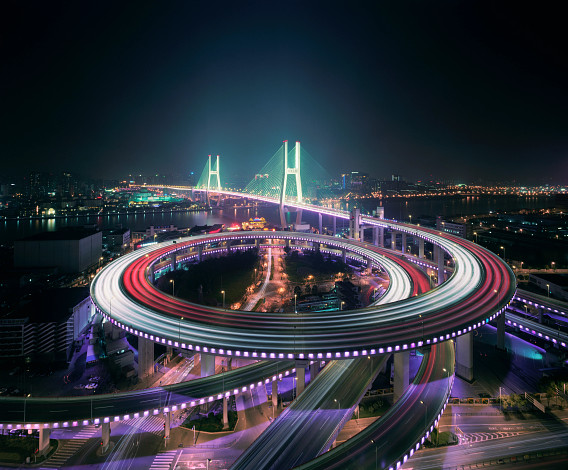 night time view of off ramp from modern bridge